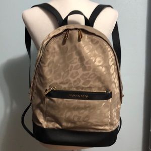 Michael Kors back pack purse.